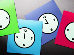 brightly colored paper clocks
