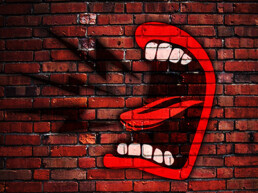 say my name - The Best Advice So Far - graffiti big mouth on brick wall